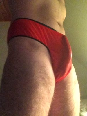 Me wearing latex briefs with my cock visible through the bulge